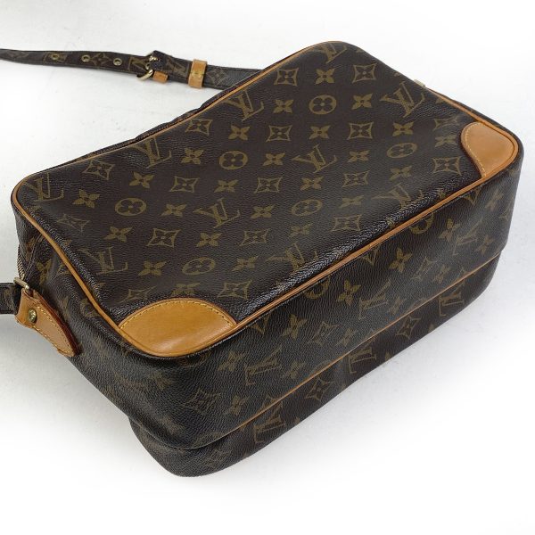 1000060649507 12 Louis Vuitton Nile Monogram Crossbody Bag Brown