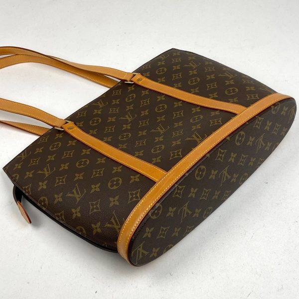 1000069425720 12 Louis Vuitton Babylon Monogram Shoulder Bag Brown