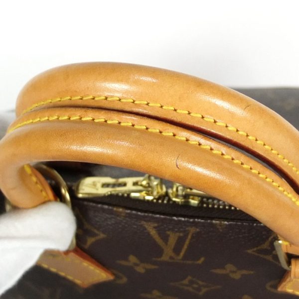 10003604 6 Louis Vuitton Alma Monogram Handbag Brown