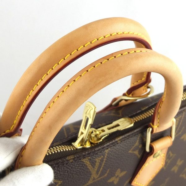 10004506 5 Louis Vuitton Alma Monogram Handbag