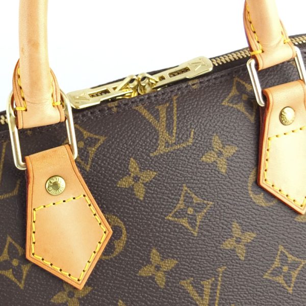 10004506 6 Louis Vuitton Alma Monogram Handbag