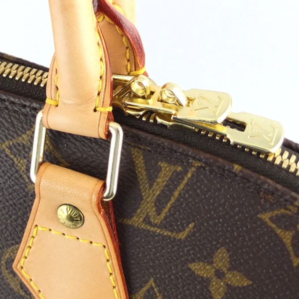 10004506 7 Louis Vuitton Alma Monogram Handbag