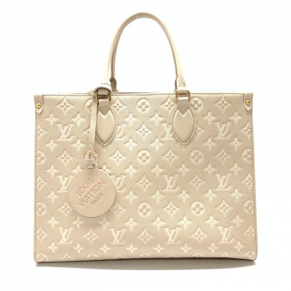 1240001029498 1 Louis Vuitton On the Go MM Monogram Empreinte Tote Bag Beige