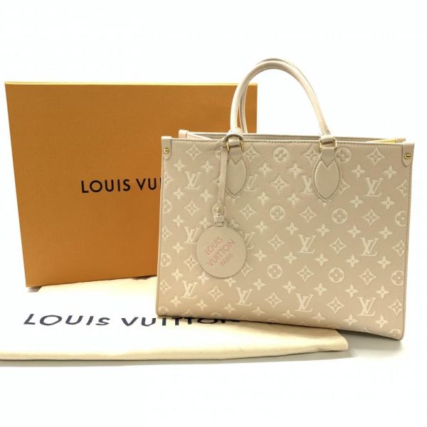 1240001029498 10 Louis Vuitton On the Go MM Monogram Empreinte Tote Bag Beige