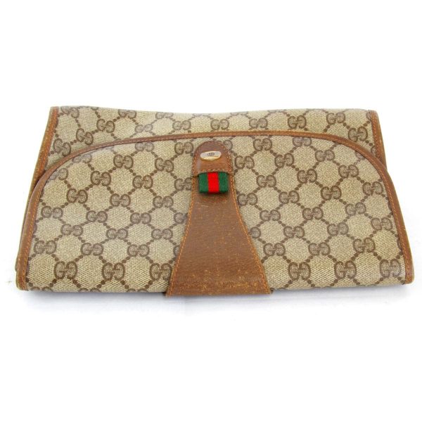 1455230906174t 6 Gucci Clutch Bag GG Plus Brown