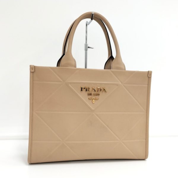 2000232251200086 1 Prada Symbol Topstitched Leather Small Bag Handbag Beige