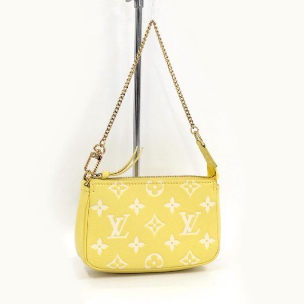 2000803252000694 1 Louis Vuitton Pochette Accessoires Mini Accessory Pouch Leather Monogram Empreinte Yellow