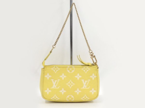 2000803252000694 2 Louis Vuitton Pochette Accessoires Mini Accessory Pouch Leather Monogram Empreinte Yellow