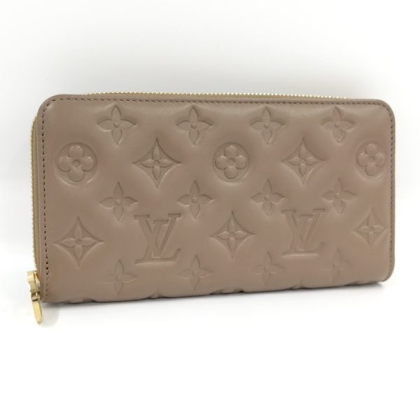 2001017251200579 1 Louis Vuitton Zippy Wallet Monogram Embossed Beige