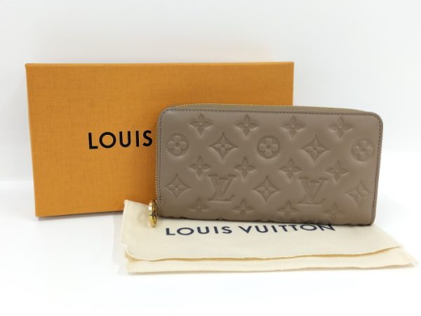 2001017251200579 9 Louis Vuitton Zippy Wallet Monogram Embossed Beige