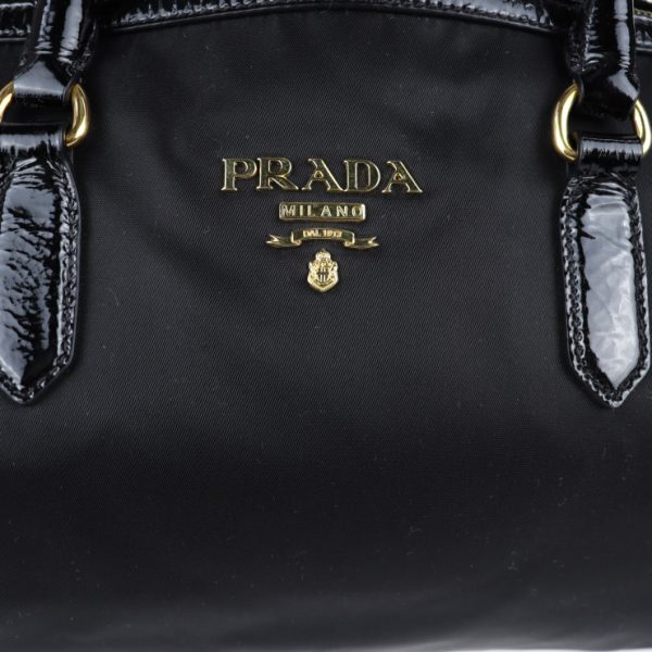 2024123007543 8 Prada Nylon Enamel Handbag Black