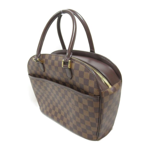 2100301121195 3 Louis Vuitton Saria Oriental Handbag Brown