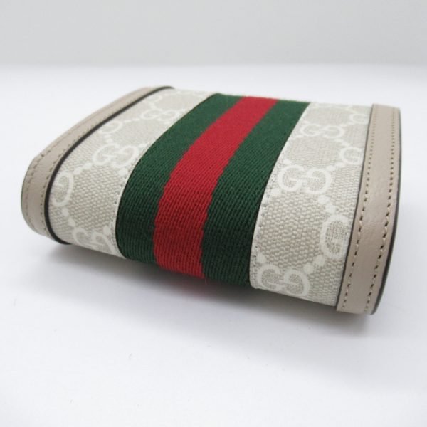 2101218038576 6 Gucci Bifold Wallet GG Canvas Beige