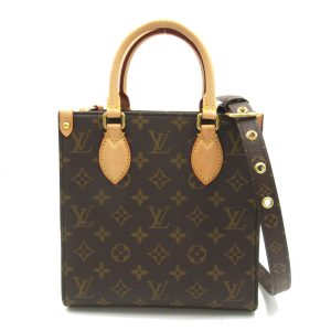 2107600976402 1 Louis Vuitton Fold Me Monogram Tanned Leather Pouch Shoulder Bag Brown