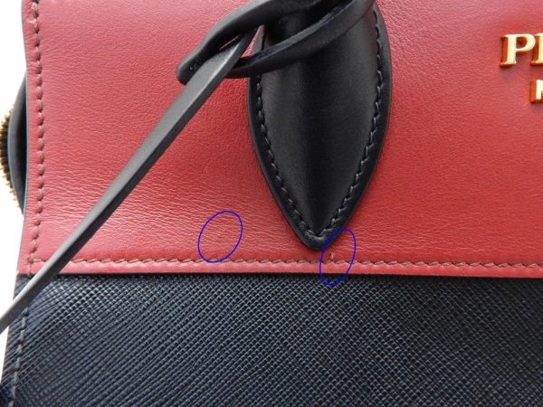 22117203300 08 Prada Saffiano Espianade Saffiano Leather Bag Nero Red