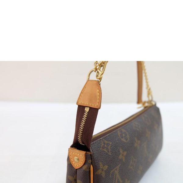 32465 6 Louis Vuitton Eva Monogram Canvas Clutch Bag