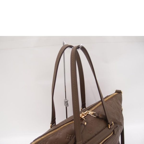 54744 4 Louis Vuitton Minius Empreinte Bag Brown