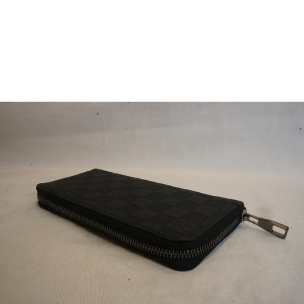 55574 3 Louis Vuitton Zippy Vertical Taiga Leather Wallet