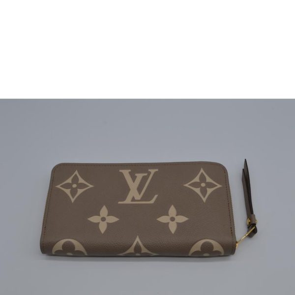 70144 2 Louis Vuitton Zippy Wallet Empreinte Creme