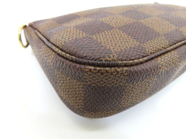 9230401601 04 Louis Vuitton Damier Ebene Mini Pochette Accessoire Pouch Brown