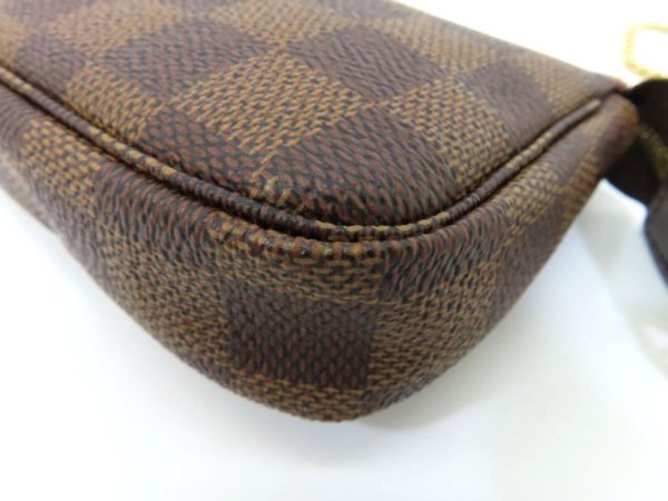 9230401601 05 Louis Vuitton Damier Ebene Mini Pochette Accessoire Pouch Brown