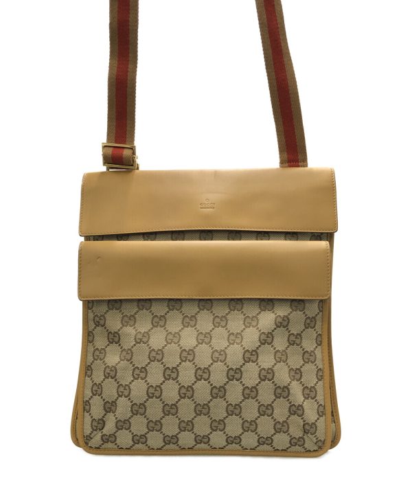 a182088006 1 Gucci Leather Shoulder Bag GG Canvas Beige