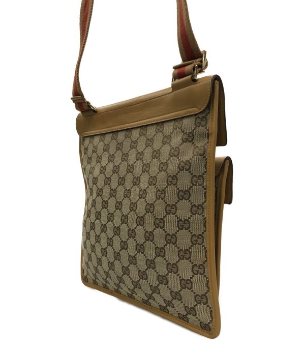 a182088006 2 Gucci Leather Shoulder Bag GG Canvas Beige