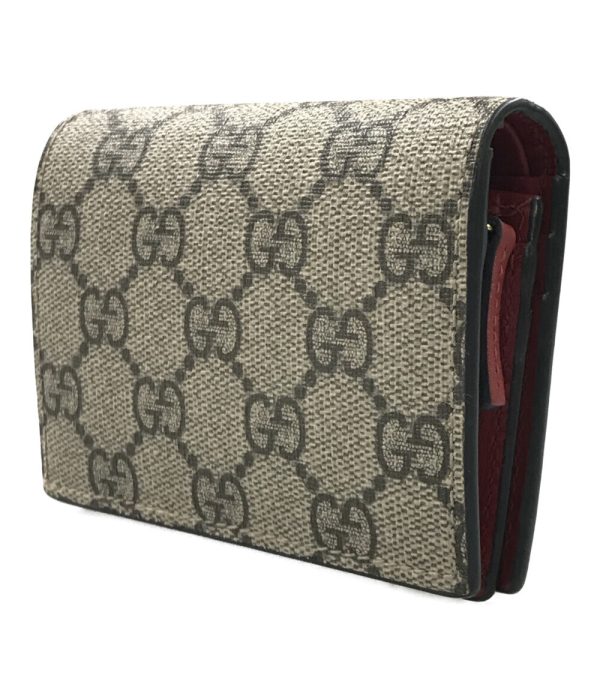 abo0055273 2 Gucci Bifold Wallet Cherry GG Supreme Beige