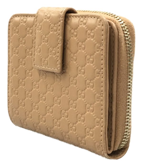 aol0131309 2 Gucci Bifold Wallet Micro Guccisima Beige