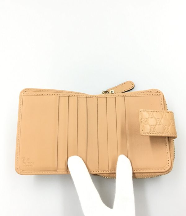 aol0131309 3 Gucci Bifold Wallet Micro Guccisima Beige