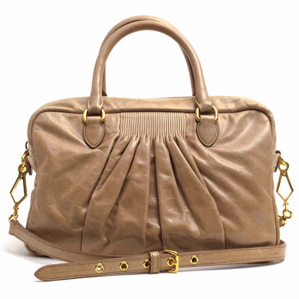 c8049 1 Miu Miu Bauletto Leather Handbag Beige