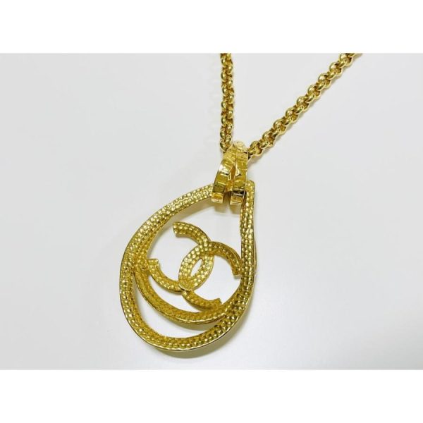 compass1681440783 Chanel Cocomark Engraved Vintage Turnlock GP Metal Pendant Necklace Gold