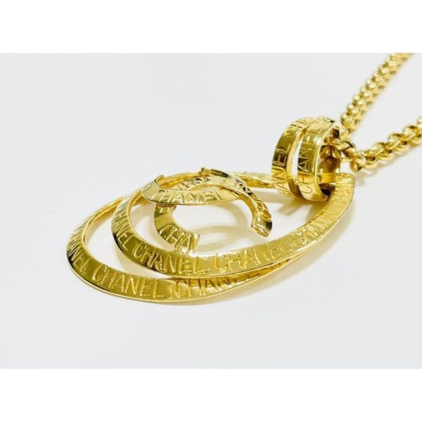 compass1681440790 Chanel Cocomark Engraved Vintage Turnlock GP Metal Pendant Necklace Gold