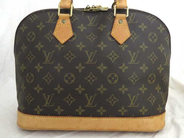 e53394a 1 Louis Vuitton Monogram Alma Handbag Brown