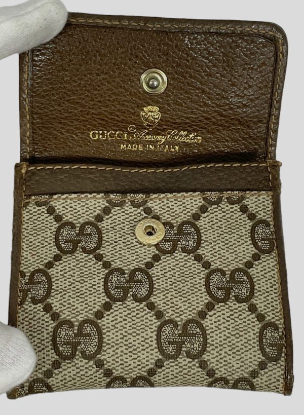 imgrc0085539781 Gucci Gg Plus Coin Case Beige