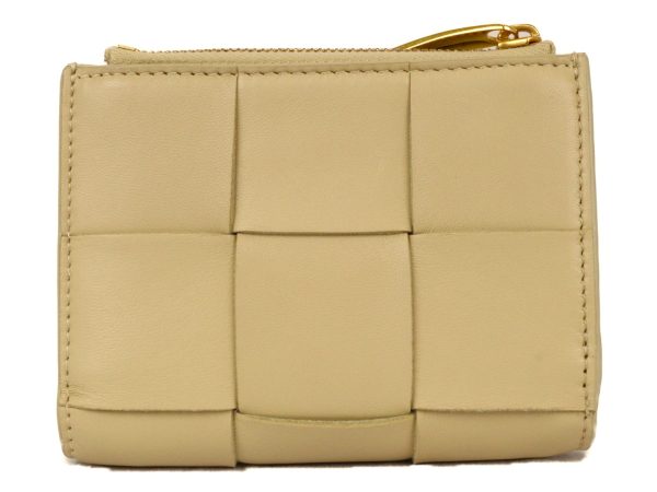 imgrc0094048392 Bottega Veneta Bi fold Zipper Compact Wallet Cream