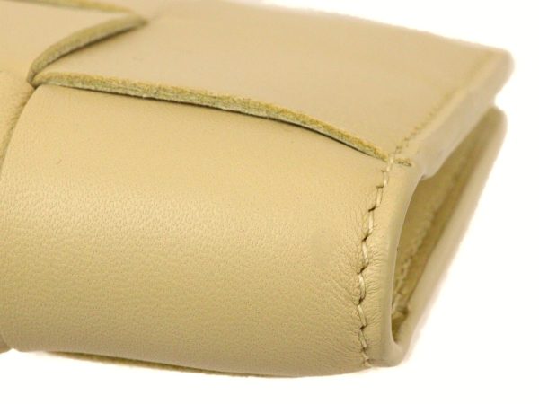 imgrc0094048396 Bottega Veneta Bi fold Zipper Compact Wallet Cream