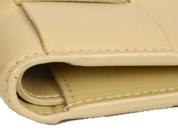 imgrc0094058584 Bottega Veneta Bi fold Zipper Compact Wallet Cream