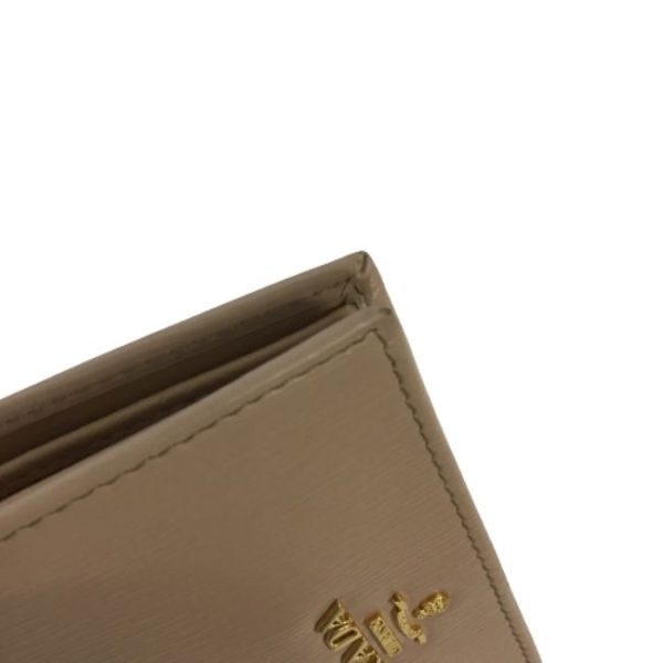 imgrc0182439606 Prada Saffiano Bifold Wallet Beige