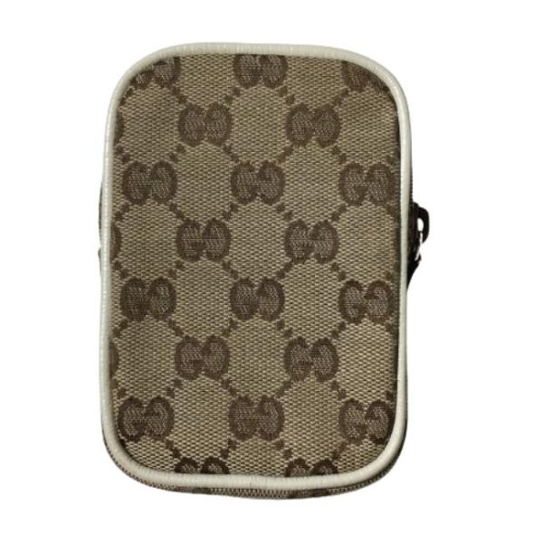 imgrc0197681889 Gucci Cigarette Case GG Canvas Pouch Brown