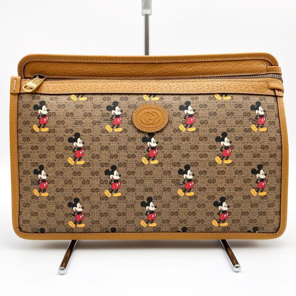 it4utdjon2z4 1 Gucci Mickey Disney Clutch Bag GG Supreme Brown