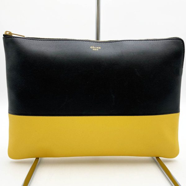 it5aeqvyoxf3 1 Celine Clutch Bag Pouch Black Yellow Bicolor Leather