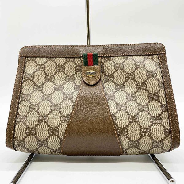 it6i3gojzc8s 1 Gucci Old Gucci Clutch Bag GG Supreme Sherry Line Brown