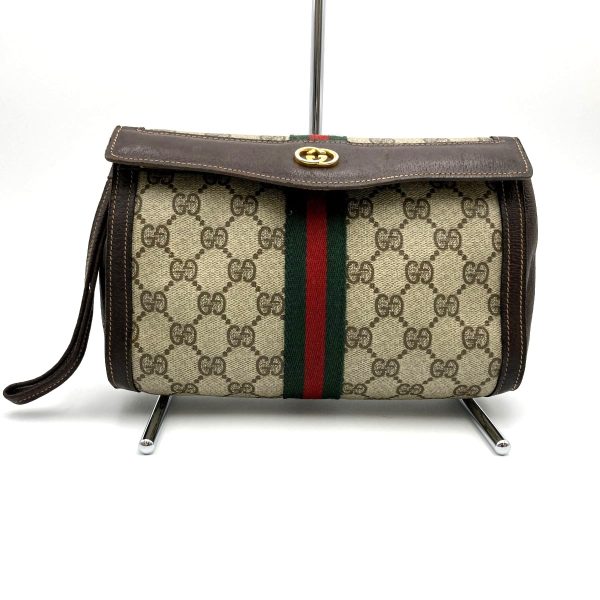 itcq4l37yij0 1 Gucci Old Gucci Clutch Bag GG Supreme Brown