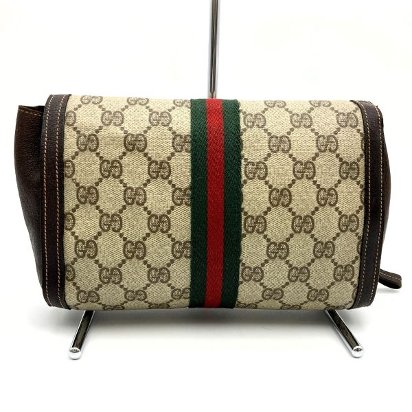 itcq4l37yij0 2 Gucci Old Gucci Clutch Bag GG Supreme Brown