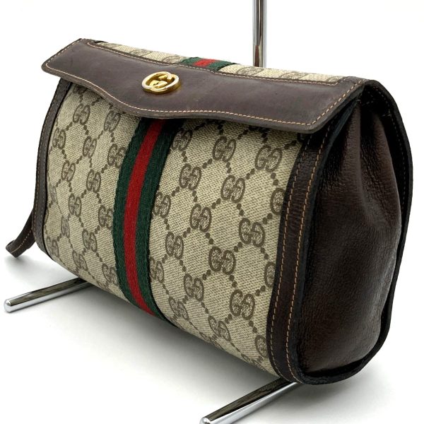 itcq4l37yij0 4 Gucci Old Gucci Clutch Bag GG Supreme Brown