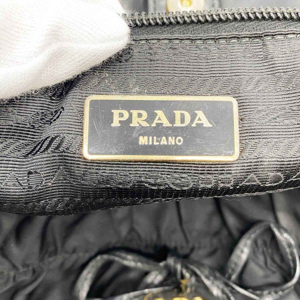 itrsyuarn8n6 5 Prada Nylon Leather Handbag with Ribbon Braided Handle Black Gold Hardware