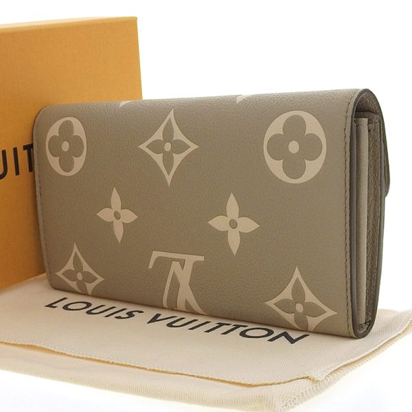 lv1378 2 Louis Vuitton Bicolor Monogram Empreinte Portefeuille Sarah Tourtrail Crème