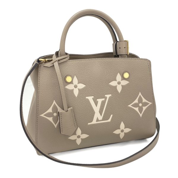 m45489 01 Louis Vuitton Monogram Empreinte Leather Handbag Beige