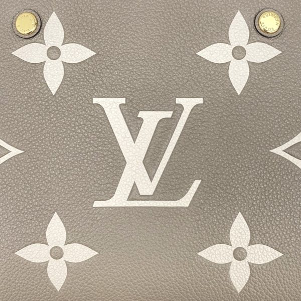 m45489 11 Louis Vuitton Monogram Empreinte Leather Handbag Beige